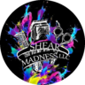 Shear Madness llc hair salon logo has a colorful paint splatter design with hairdresser tools